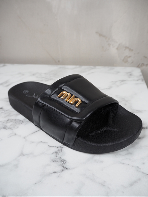 italienische mode kleiber werksverkauf Schwarze gesteppte Leder-Slides mit goldenem „MIN“-Logo