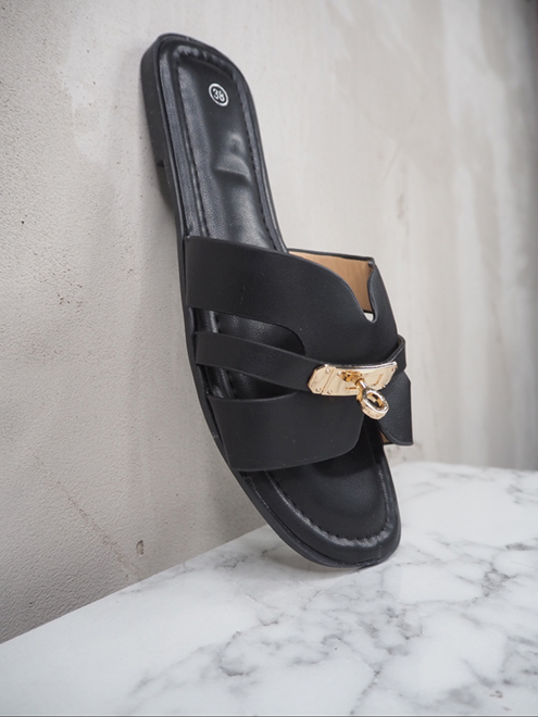 italienische mode kleiber werksverkauf Schwarze Slidesandalen aus Leder mit goldenem Akzent