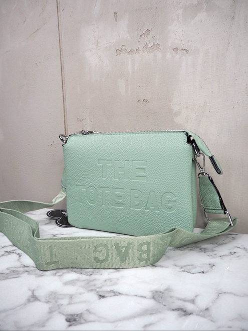 italienische mode kleiber werksverkauf Mintgrüne Umhängetasche mit der Prägung „The Tote Bag“.