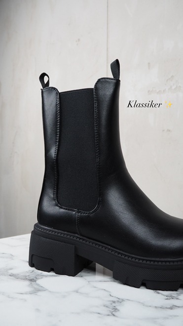 italienische mode kleiber werksverkauf Schwarze Chelsea-Stiefel mit dicker Sohle, ein Schuhtrend für den Herbst