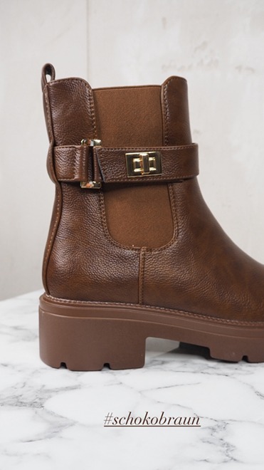 italienische mode kleiber werksverkauf Braune Lederstiefelette mit goldener Schnalle, perfekt für die Herbstmode. #schokobraun