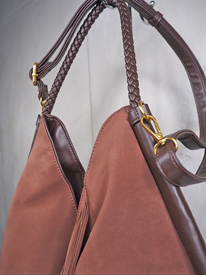 italienische mode kleiber werksverkauf Braune Wildleder-Tasche mit geflochtenen Henkeln und goldener Hardware
