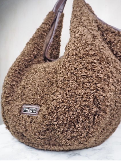 italienische mode kleiber werksverkauf Braune Teddy-Tasche mit braunen Lederdetails